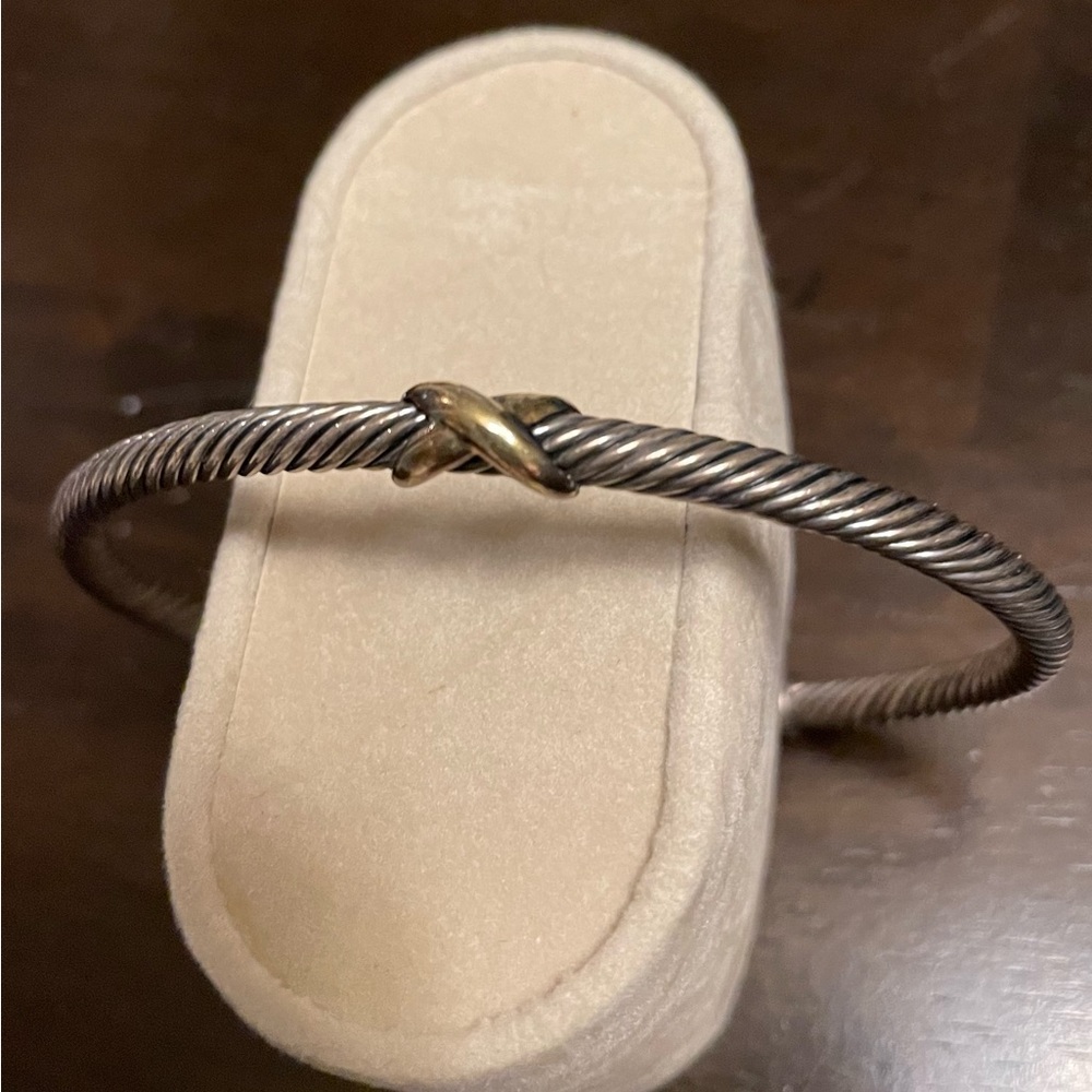 David Yurman silver and gold cable bracelet.